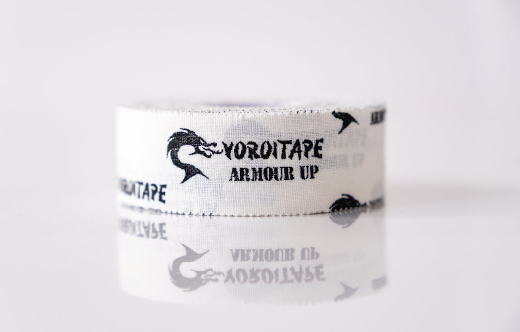 Yoroi 15 fight deal with red/blue glove tape.